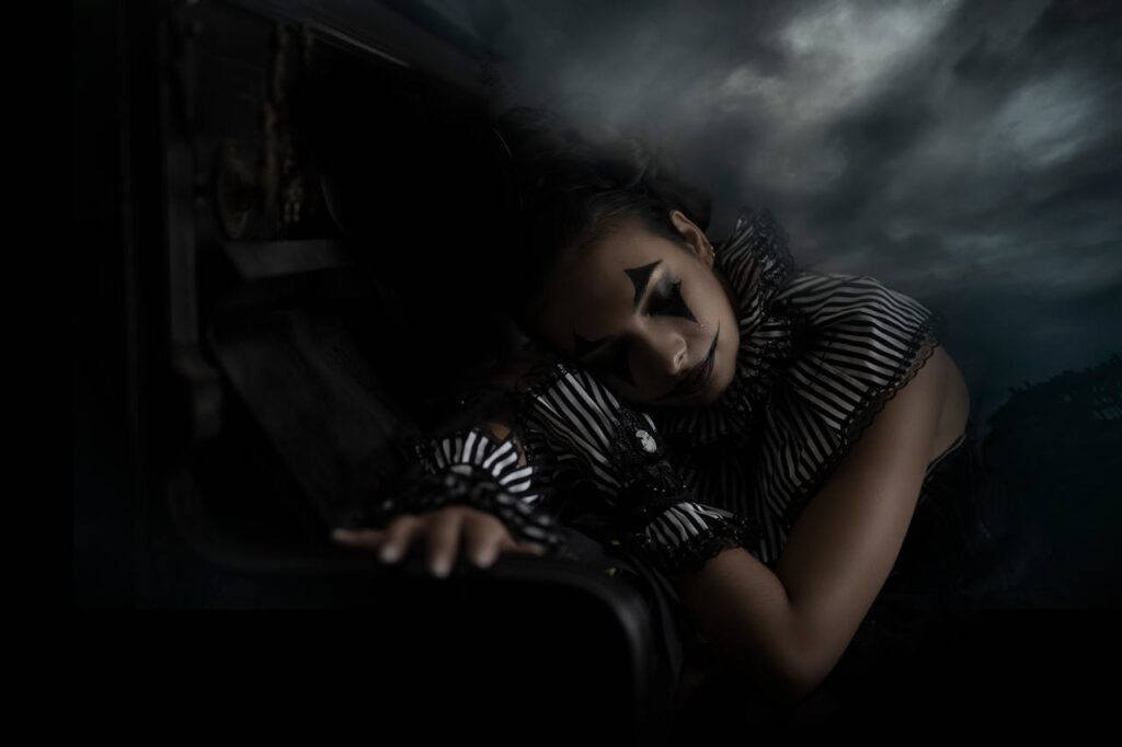pexels photo 14158784 Moody portrait of a gothic clown in a dramatic, eerie setting.